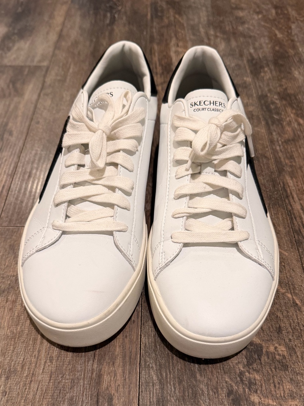 Skechers White Sneakers with Black Side Accent